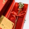 Pozlátená ruža s vázou - červená krabička